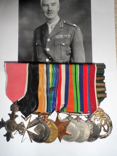 FINE GROUP OF NINE TO LT COL BEEVOR O..B.E-TERRITORIAL DECORATION WITH FOUR CONFIRMED  CLASPS