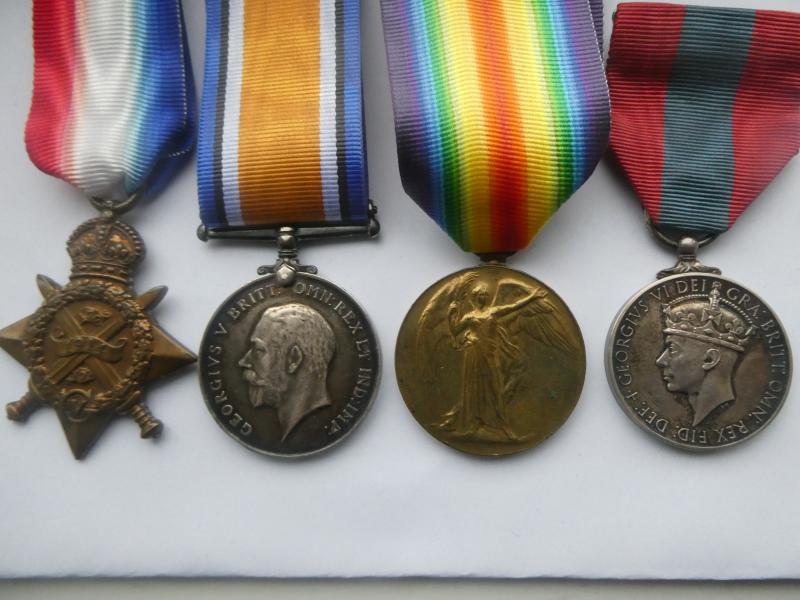 1914 STAR TRIO AND IMPERIAL SERVICE MEDAL-TO JOHN WILLIAM WOODS ROYAL FIELD ARTILLERY-ENTITLED TO CLASP