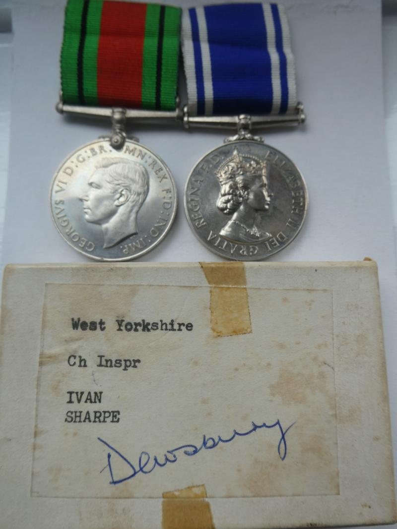 DEFENCE MEDAL AND POLICE EXEMPLARY SERVICE MEDAL TO CHIEF INSPECTOR IVAN SHARPE-WEST YORKSHIRE POLICE