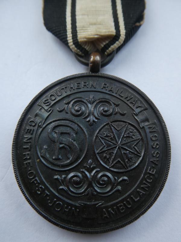 SOUTHERN RAILWAYS CENTRE OF ST.JOHN AMBULANCE ASSOCIATION BRONZE MEDAL WITH 7 YEARS CALSP-NAMED TO: KENNETH WALTON 1932