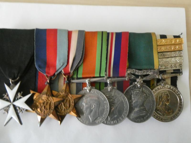 ORDER OF ST JOHN AND TERRITORIAL EFFICIENCY GROUP OF SEVEN TO SERGT FOULSTONE- ROYAL MILITARY POLICE AND ST JOHN'S AMBULANCE