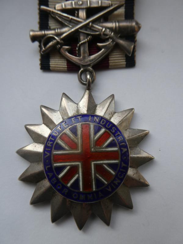 CORPS OF COMMISSIONAIRES SILVER MEDAL TO B.E.T.LANE