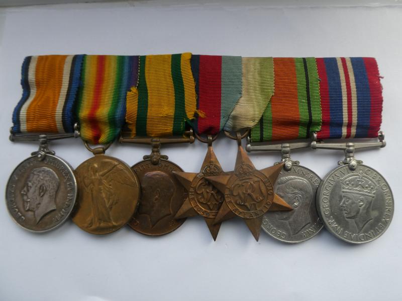 UNUSUAL TERRITORIAL FORCE WAR MEDAL GROUP OF SEVEN TO COOPER- NORFOLK REGT AND ROYAL NAVY