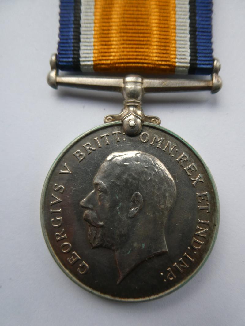 BRITISH WAR MEDAL-TO ERIC WILLIAM CASLON-A MEMBER OF THE CASLON FAMILY-FAMOUS FOR PRODUCING THE CASLON TYPEFACE