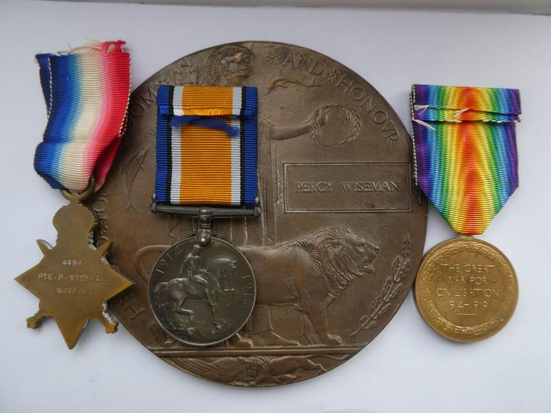 1914/15 STAR TRIO AND BRONZE MEMORIAL PLAQUE- TO PERCY WISEMAN-4TH NORFOLK REGT- DIED AT MUDROS 28TH NOVEMBER-1915