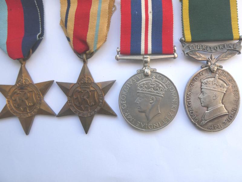 TERRITORIAL EFFICENCY MEDAL GROUP OF THREE TO AGER- ESSEX REGT-TAKEN AS A PRISONER OF WAR ON 01/07/1942-FOLLOWING THE ESSEX REGIMENT'S LASY STAND AT DEIR-EL-SHEIN